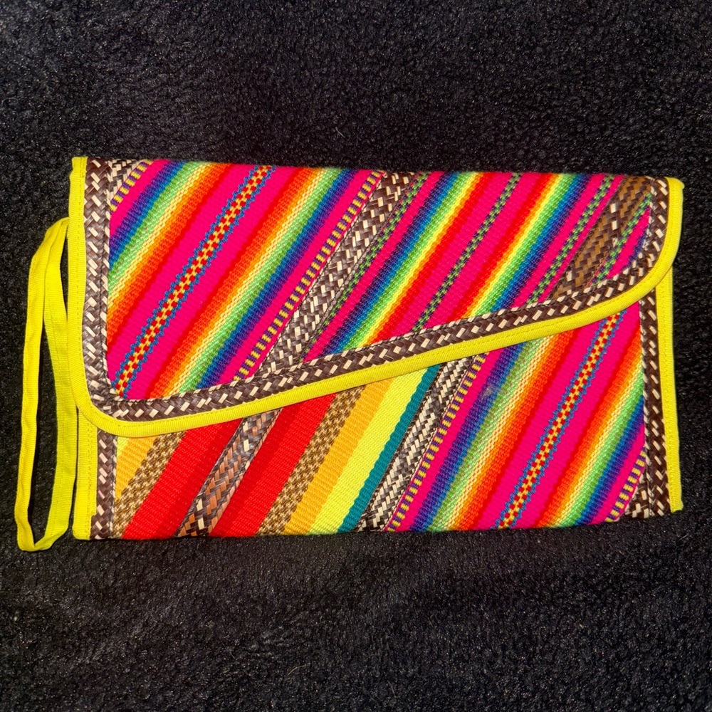 Hand stitched clutch